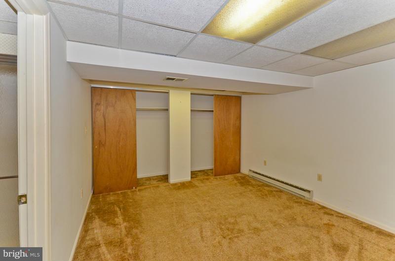 6810 Field Master Drive Springfield, VA 22153 - Photo 22 of 25 Lower Level Bedroom with lots of closet space.
