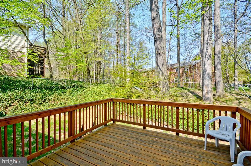 6810 Field Master Drive Springfield, VA 22153 - Photo 23 of 25 Large newer deck - open to backyard.