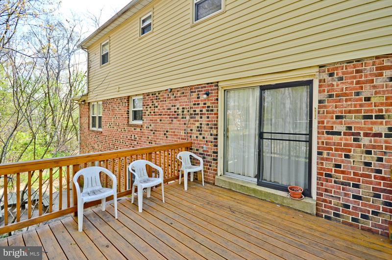 6810 Field Master Drive Springfield, VA 22153 - Photo 24 of 25 Large newer deck - great extension of living area.