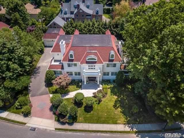 48 A Arleigh Road Great Neck, NY 11021 - Photo 1 of 1 an aerial view of a house with a yard and large trees