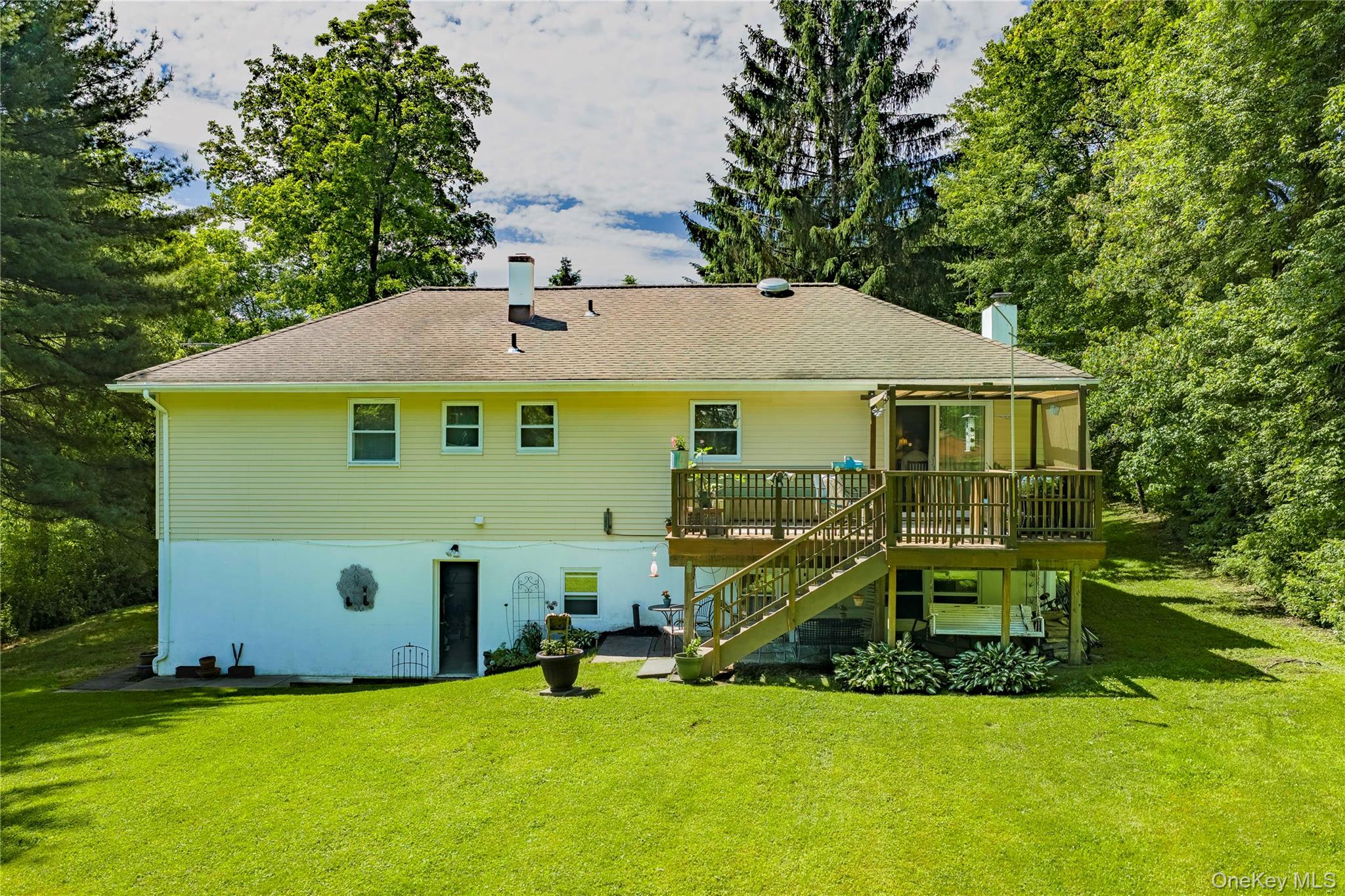 32 Cobb Road Brewster, NY 10509 - Photo 5 of 49 a view of a house with a yard