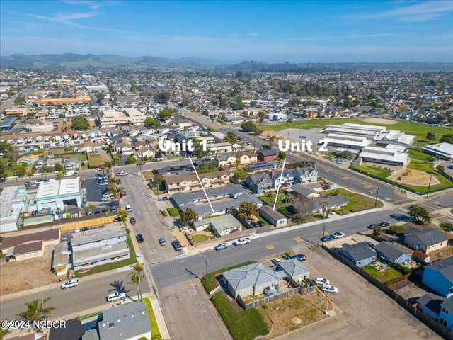 an aerial view of a city with lots of residential buildings