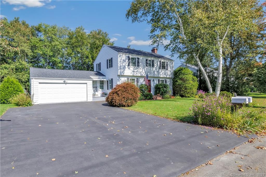 68 Sorghum Road Shelton, CT 06484 - Photo 1 of 1 a house view with a garden space