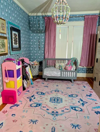 a bedroom with furniture and a bed