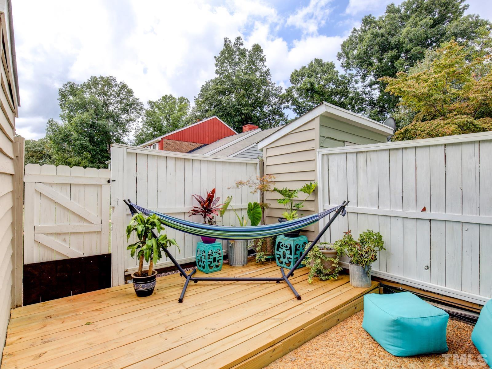 5423 Pine Top Circle Raleigh, NC 27612 - Photo 26 of 30 a view of a house with backyard and sitting area