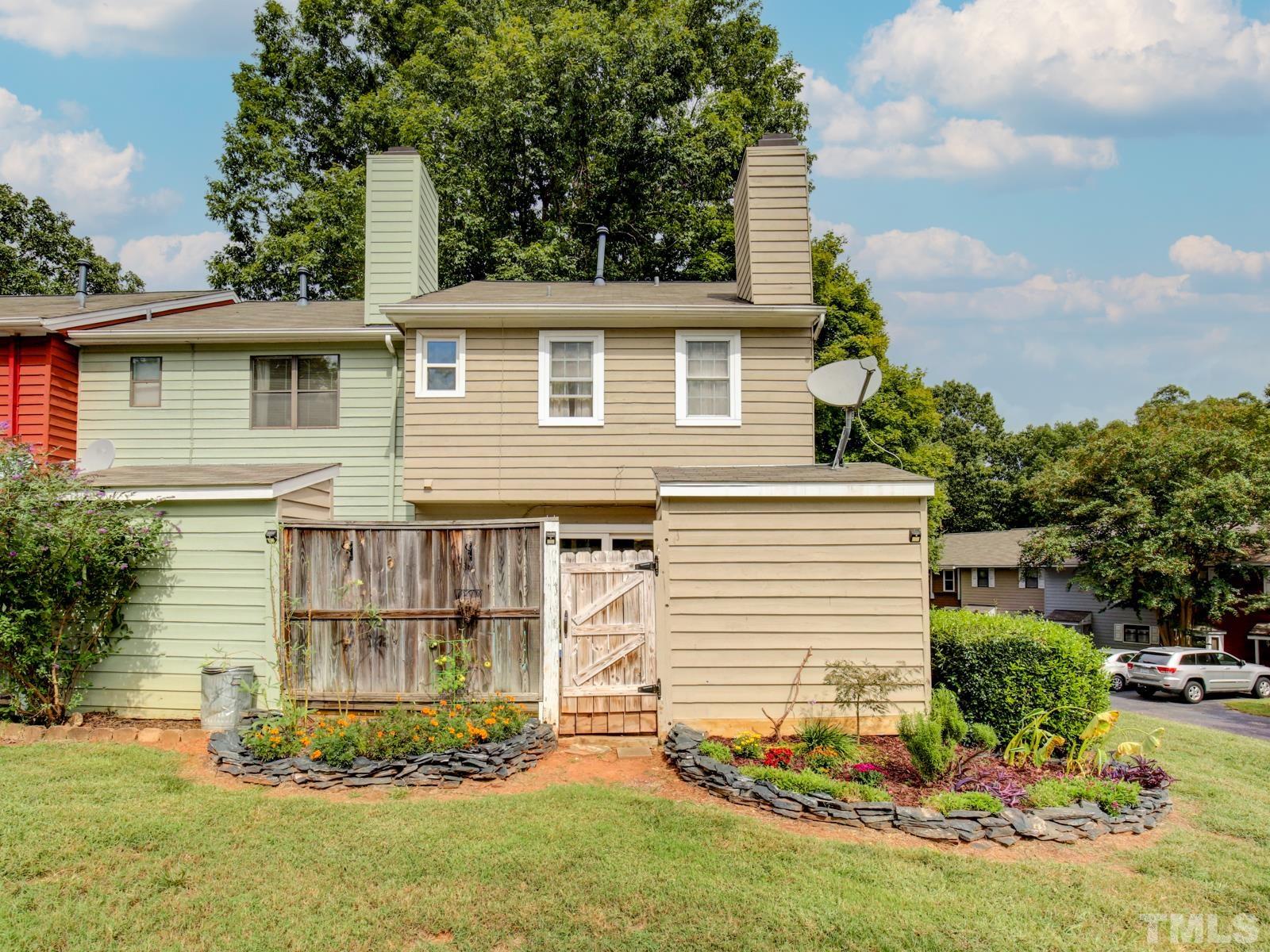 5423 Pine Top Circle Raleigh, NC 27612 - Photo 29 of 30 front view of a house with a yard