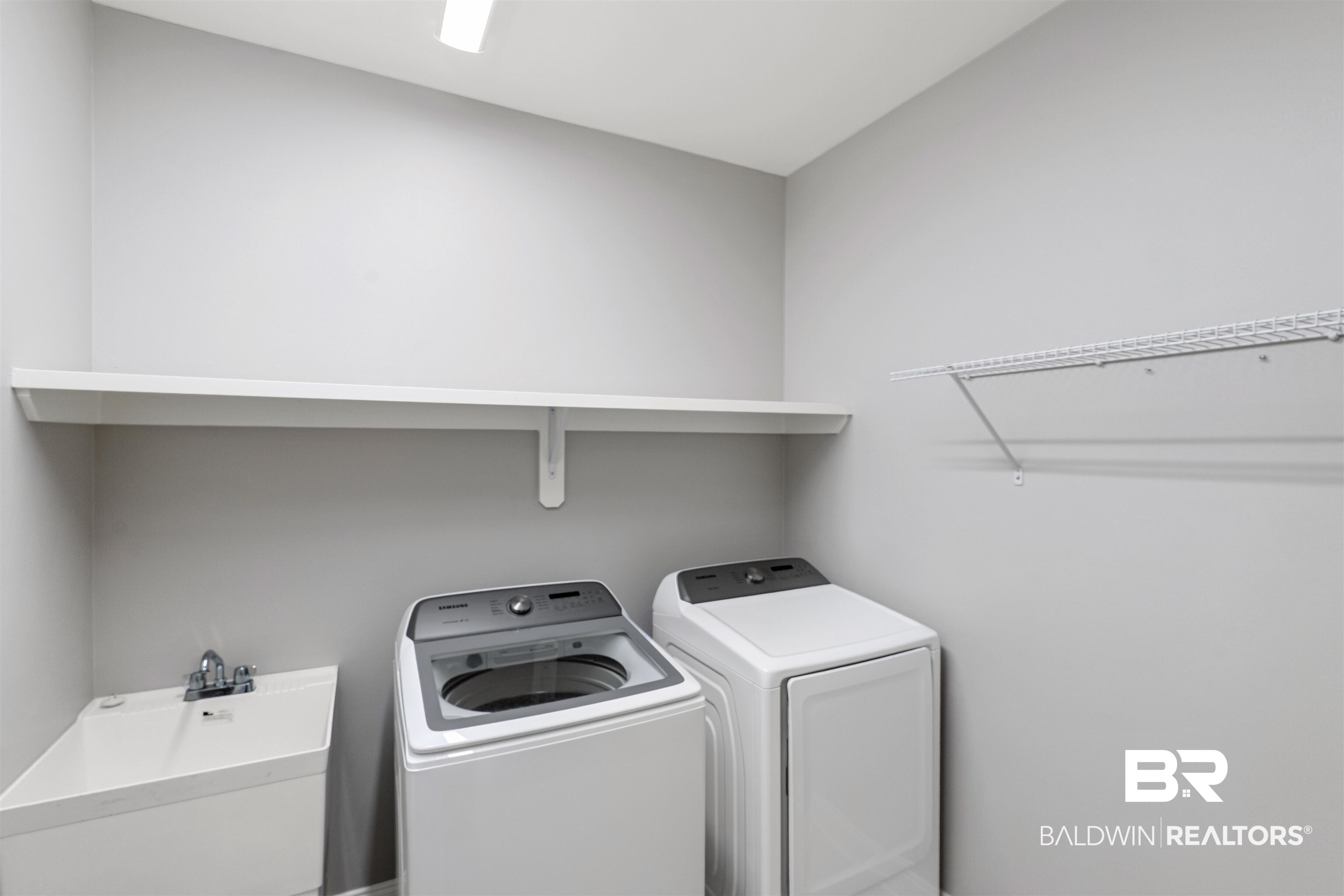 24838 Slater Mill Road Daphne, AL 36526 - Photo 19 of 46 Laundry room with washing machine and dryer