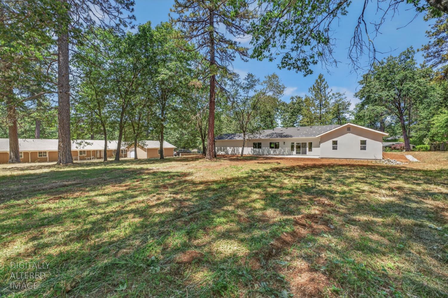 280 Jan Road Grass Valley, CA 95945 - Photo 37 of 66 a front view of a house with a yard