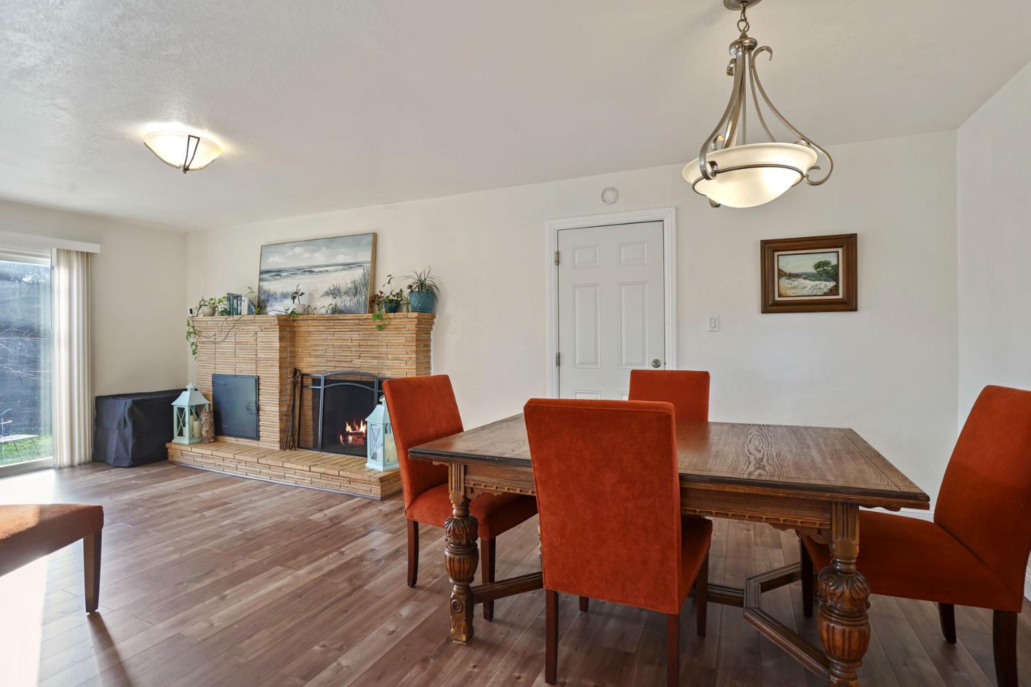 8814 Mohawk Way Fair Oaks, CA 95628 - Photo 13 of 34 a view of a dining room with furniture and wooden floor