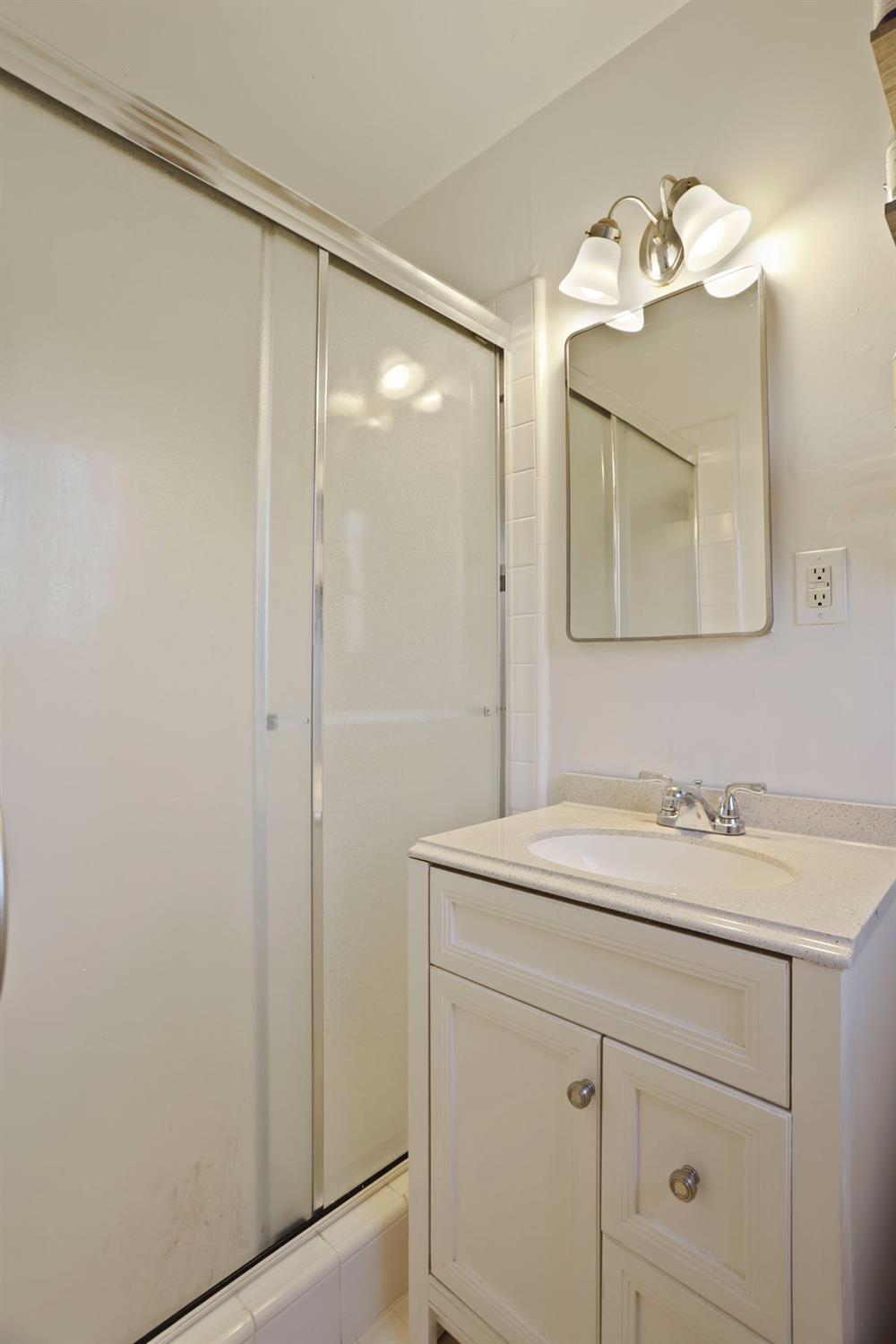 8814 Mohawk Way Fair Oaks, CA 95628 - Photo 25 of 34 a bathroom with a sink and a mirror