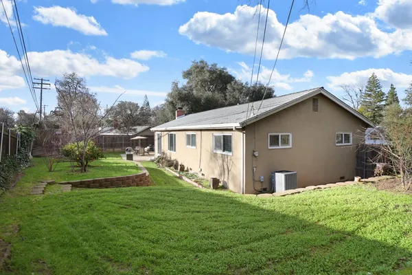a view of a backyard with a garden