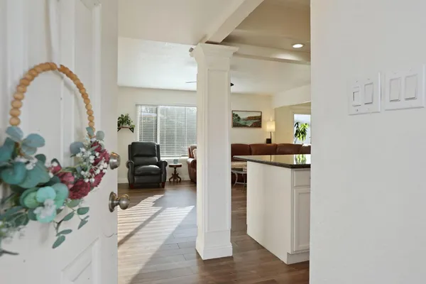 a kitchen view with living room and furniture