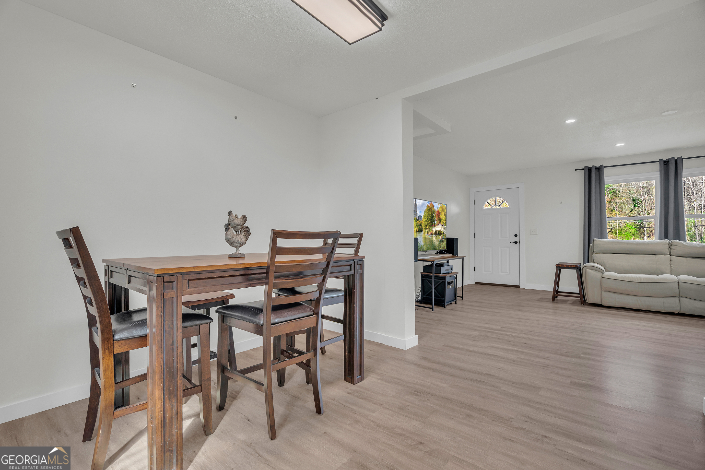 156 White Pine Road Toccoa, GA 30577 - Photo 12 of 57 a view of a dining room with furniture and wooden floor