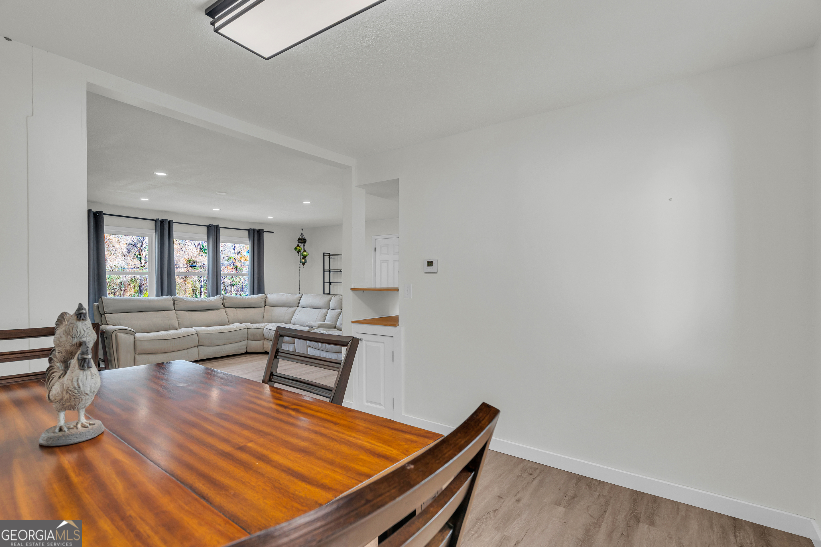 156 White Pine Road Toccoa, GA 30577 - Photo 13 of 57 a living room with wooden floor and furniture
