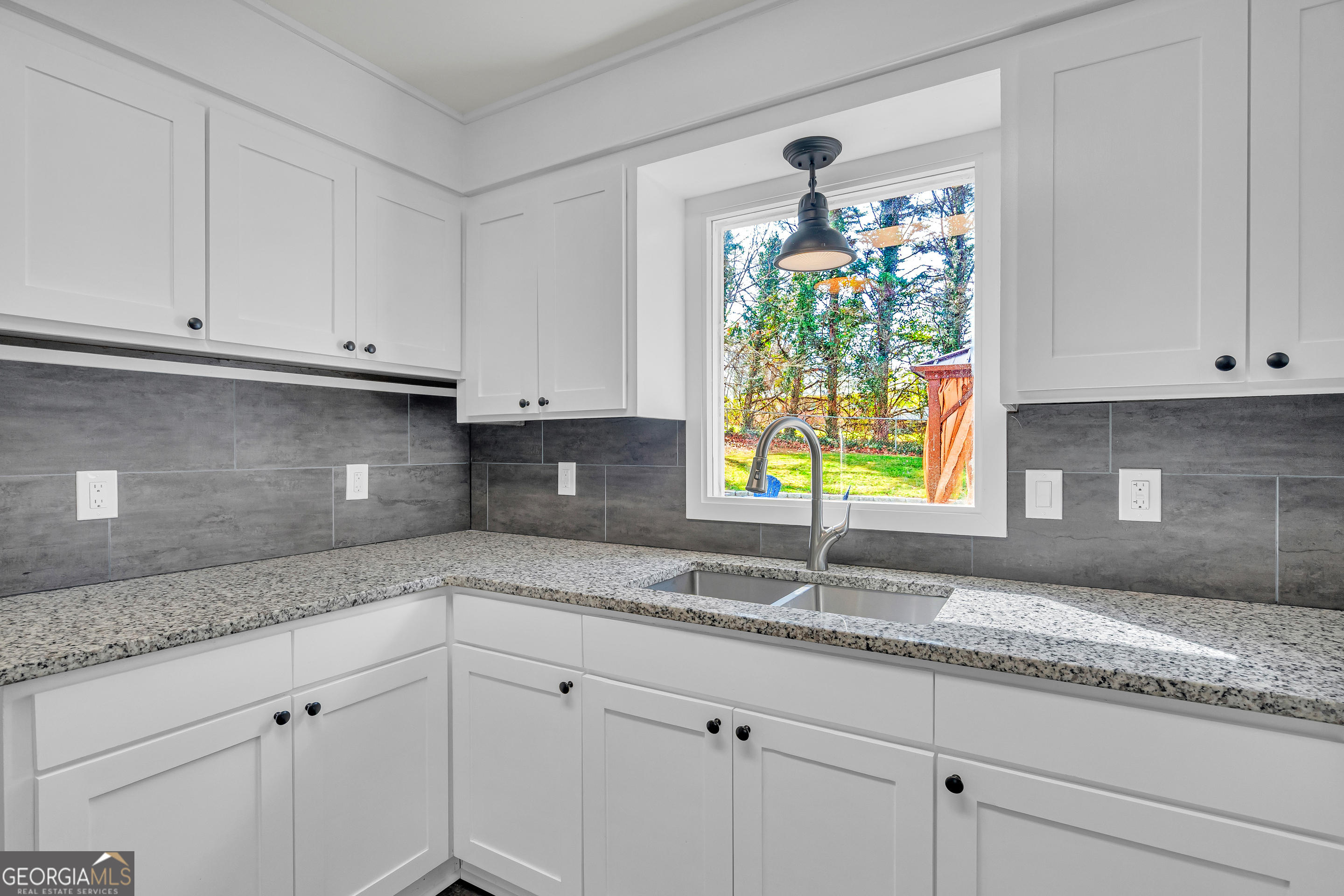 156 White Pine Road Toccoa, GA 30577 - Photo 17 of 57 a kitchen with granite countertop white cabinets white appliances and a granite counter tops