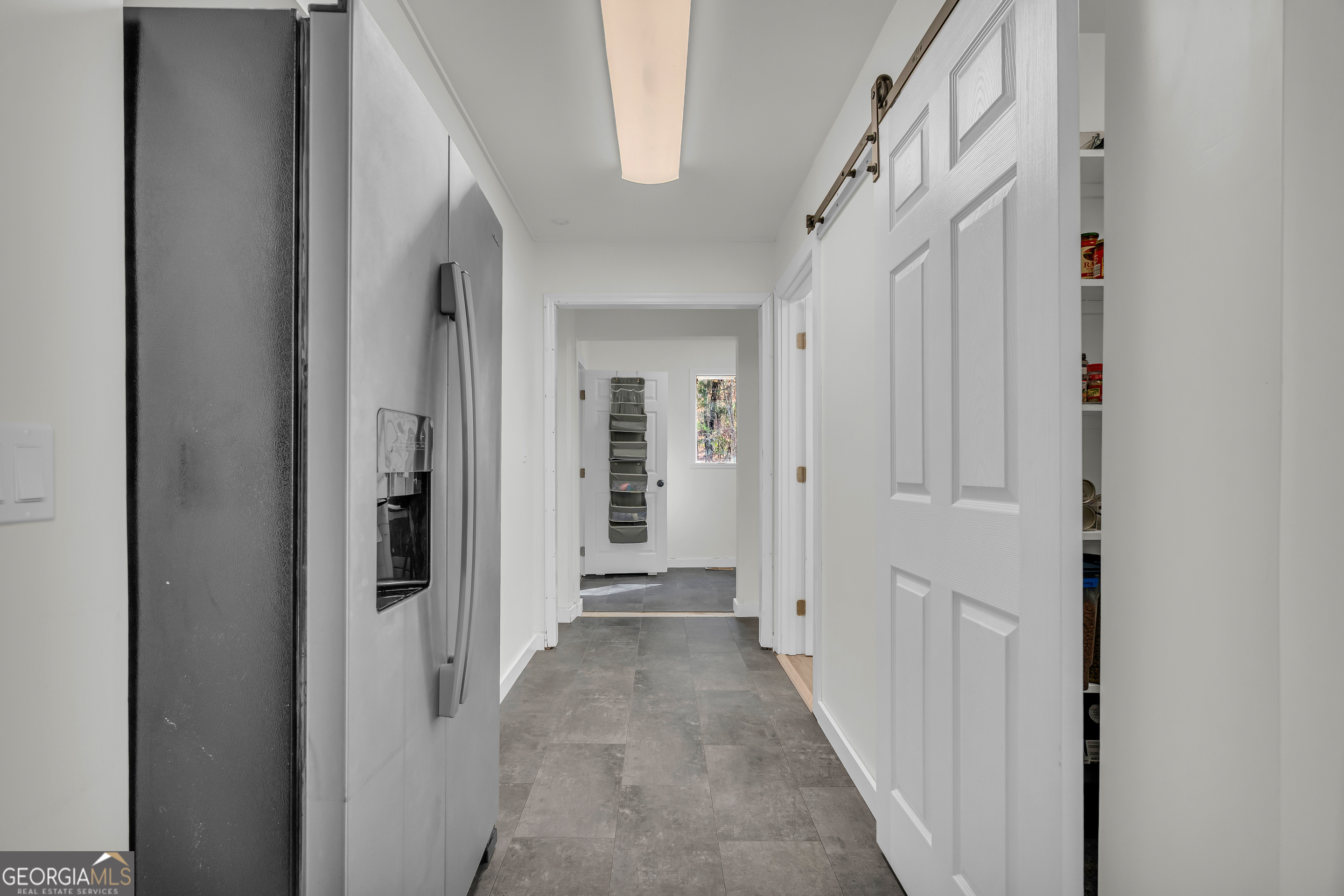 156 White Pine Road Toccoa, GA 30577 - Photo 18 of 55 a view of a hallway with a wooden door