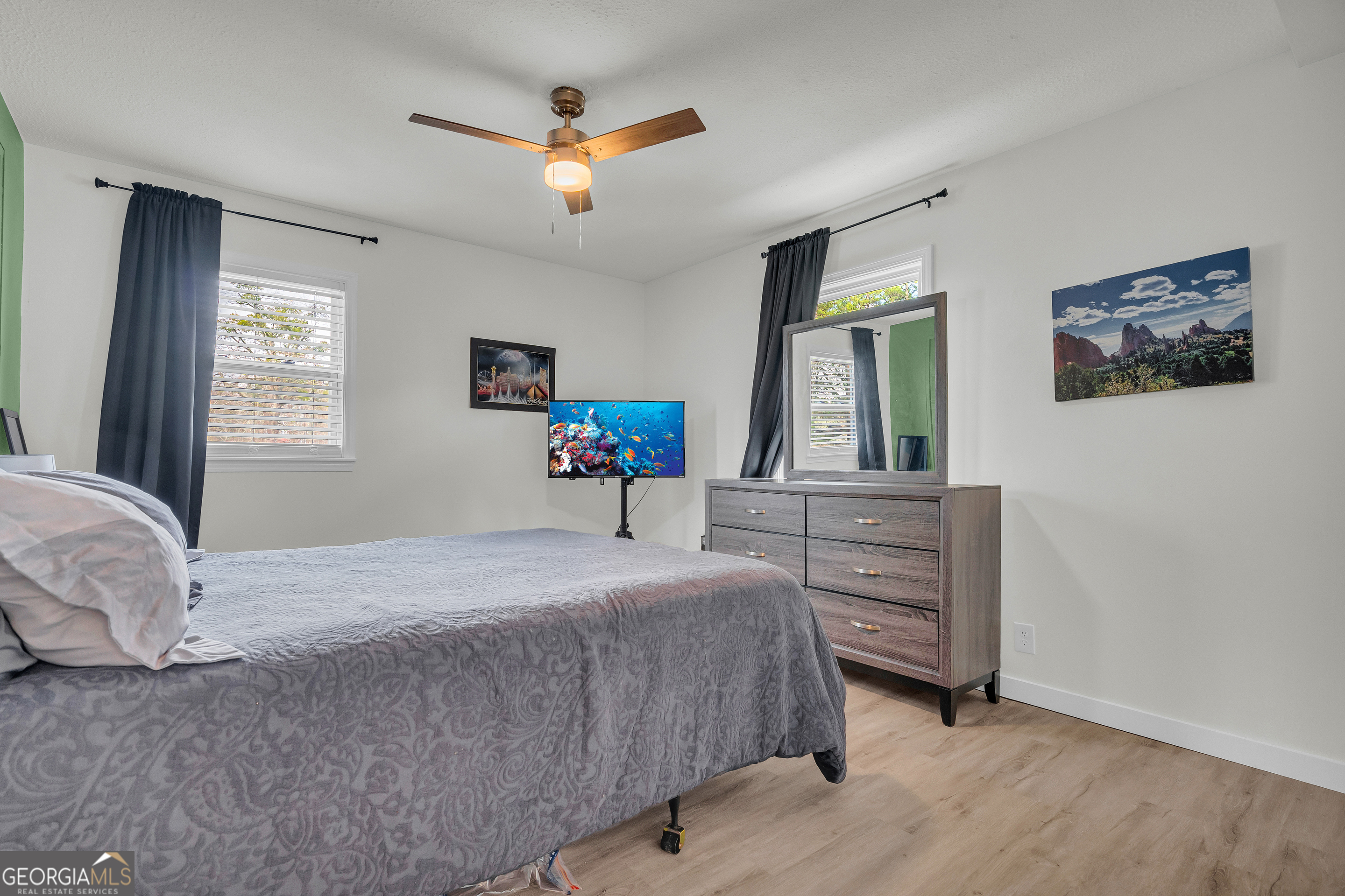 156 White Pine Road Toccoa, GA 30577 - Photo 29 of 55 a bedroom with a bed and a dresser