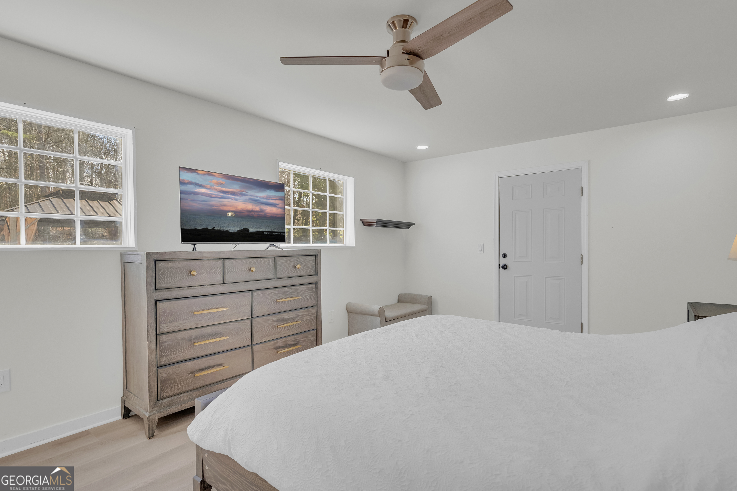 156 White Pine Road Toccoa, GA 30577 - Photo 41 of 57 a bedroom with a bed and flat screen tv