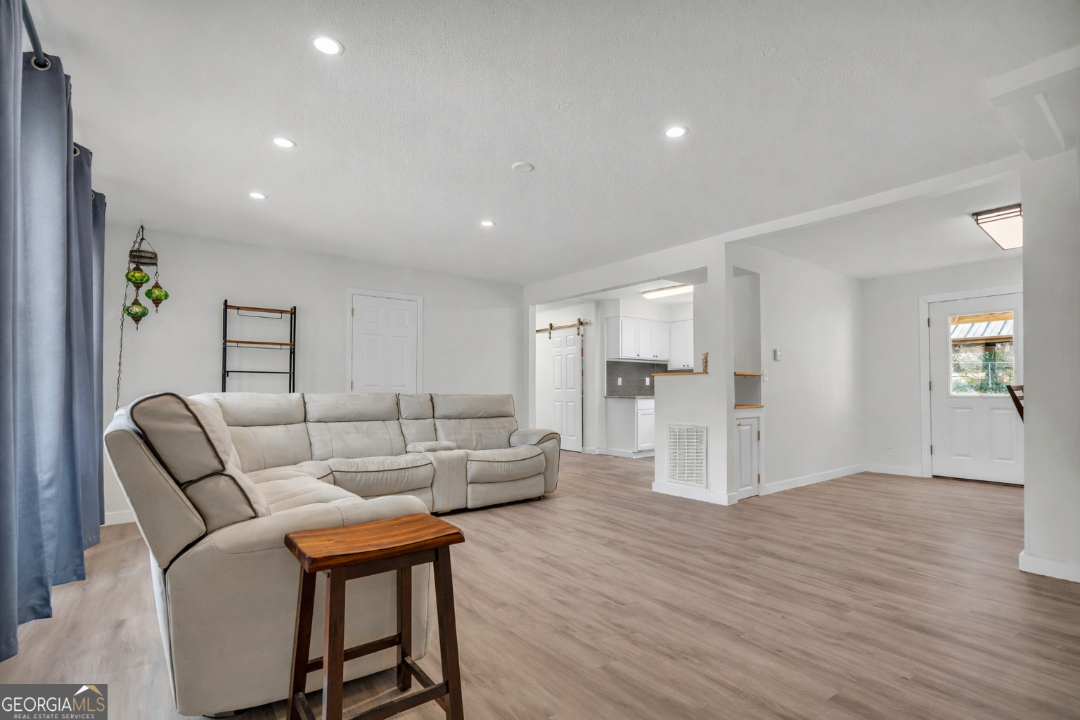 156 White Pine Road Toccoa, GA 30577 - Photo 6 of 57 a living room with furniture and a wooden floor