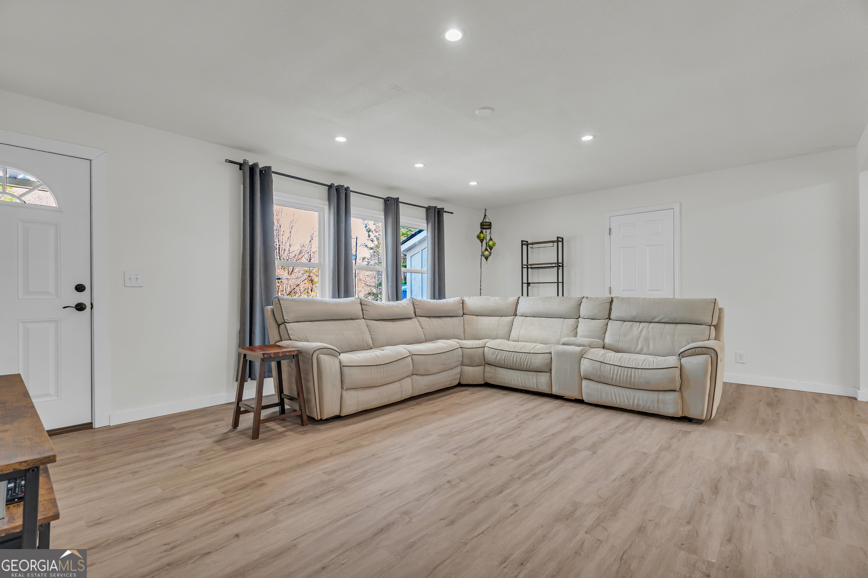 156 White Pine Road Toccoa, GA 30577 - Photo 8 of 57 a living room with furniture and a wooden floor