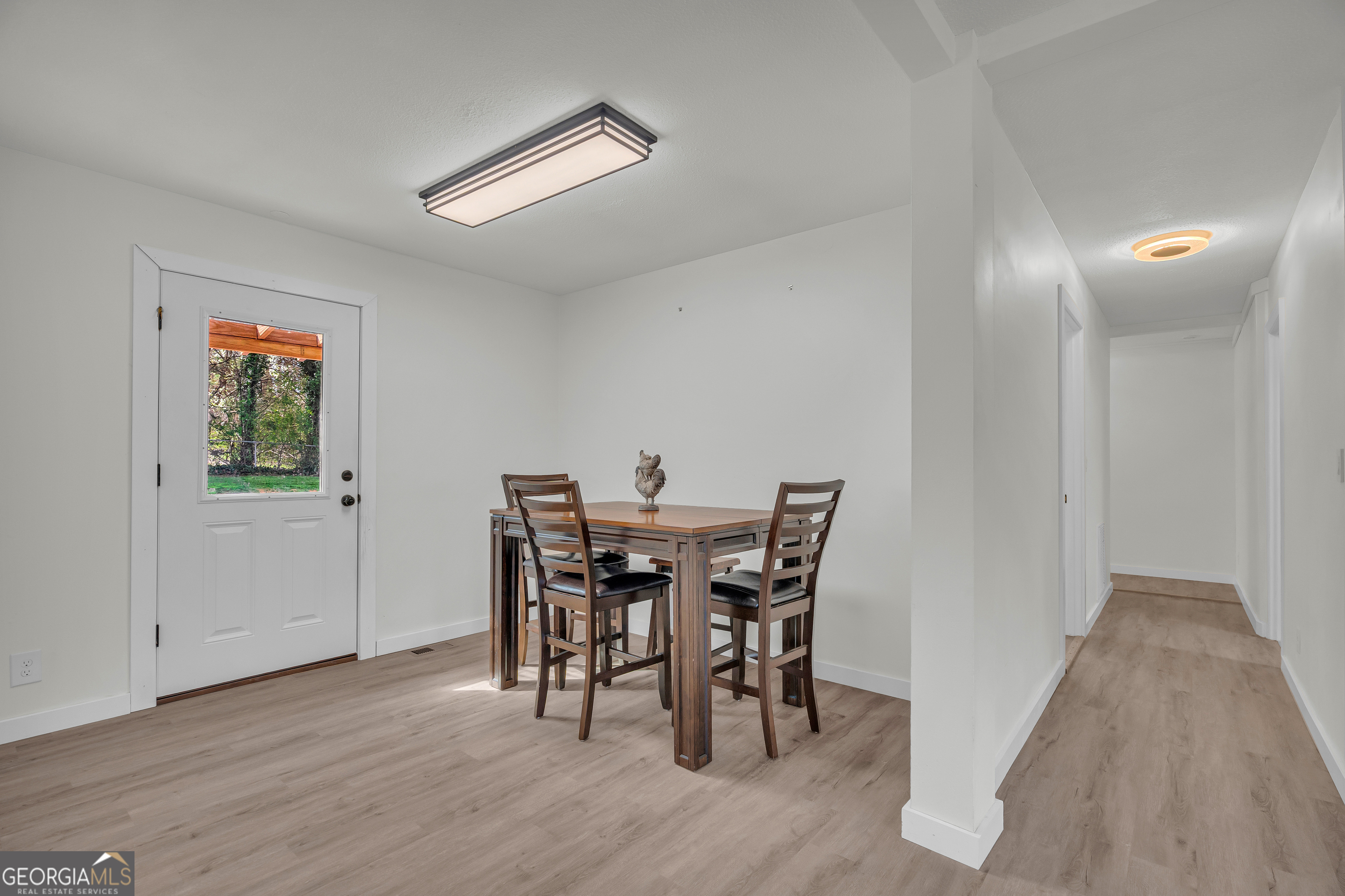 156 White Pine Road Toccoa, GA 30577 - Photo 10 of 57 a view of a dining room with furniture and wooden floor