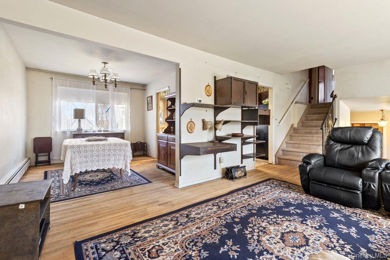 24 Highview Road Ossining, NY 10562 - Photo 9 of 43 View of living room that leads into dining room.