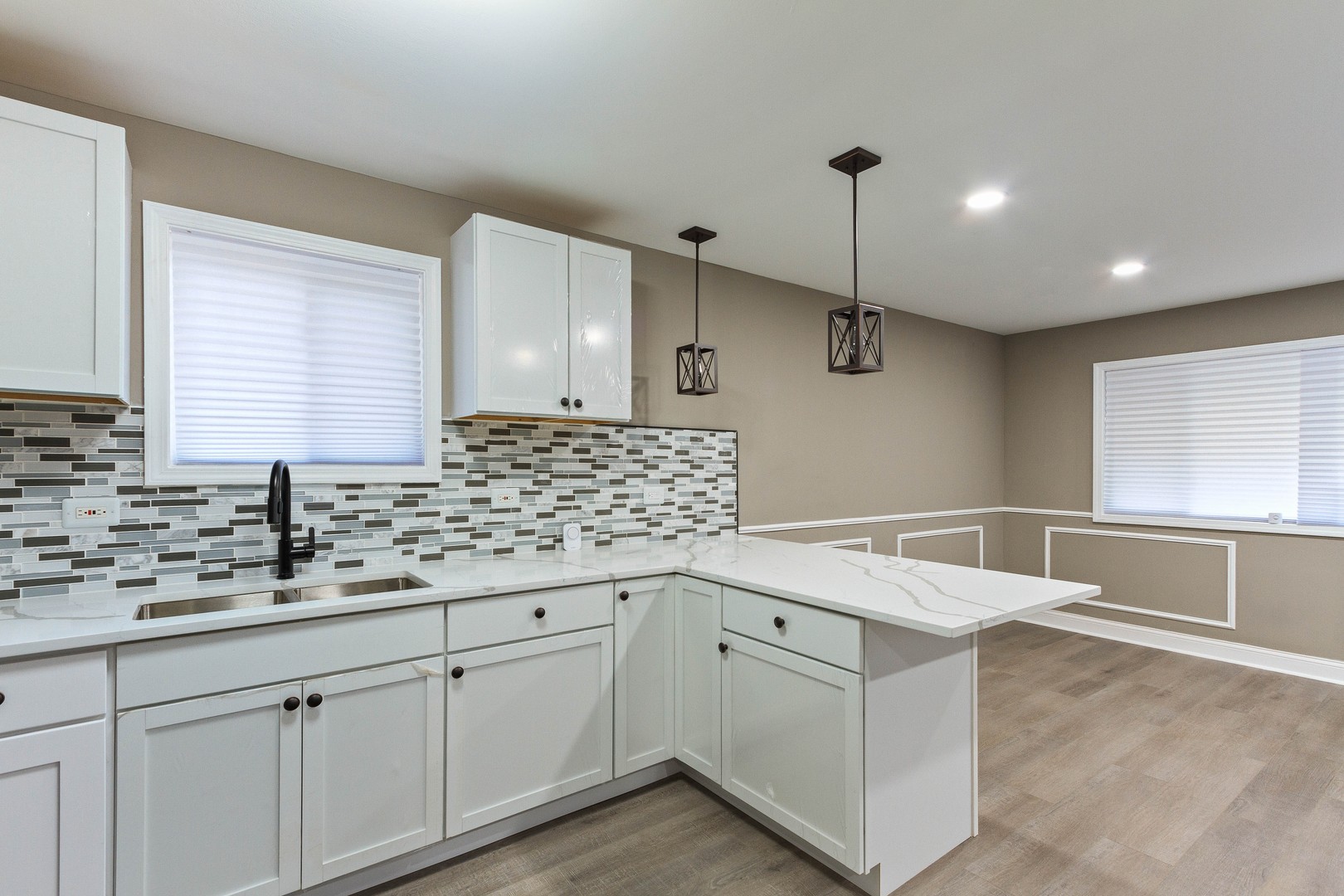10002 South Normal Avenue Chicago, IL 60628 - Photo 11 of 29 a kitchen with a sink and cabinets