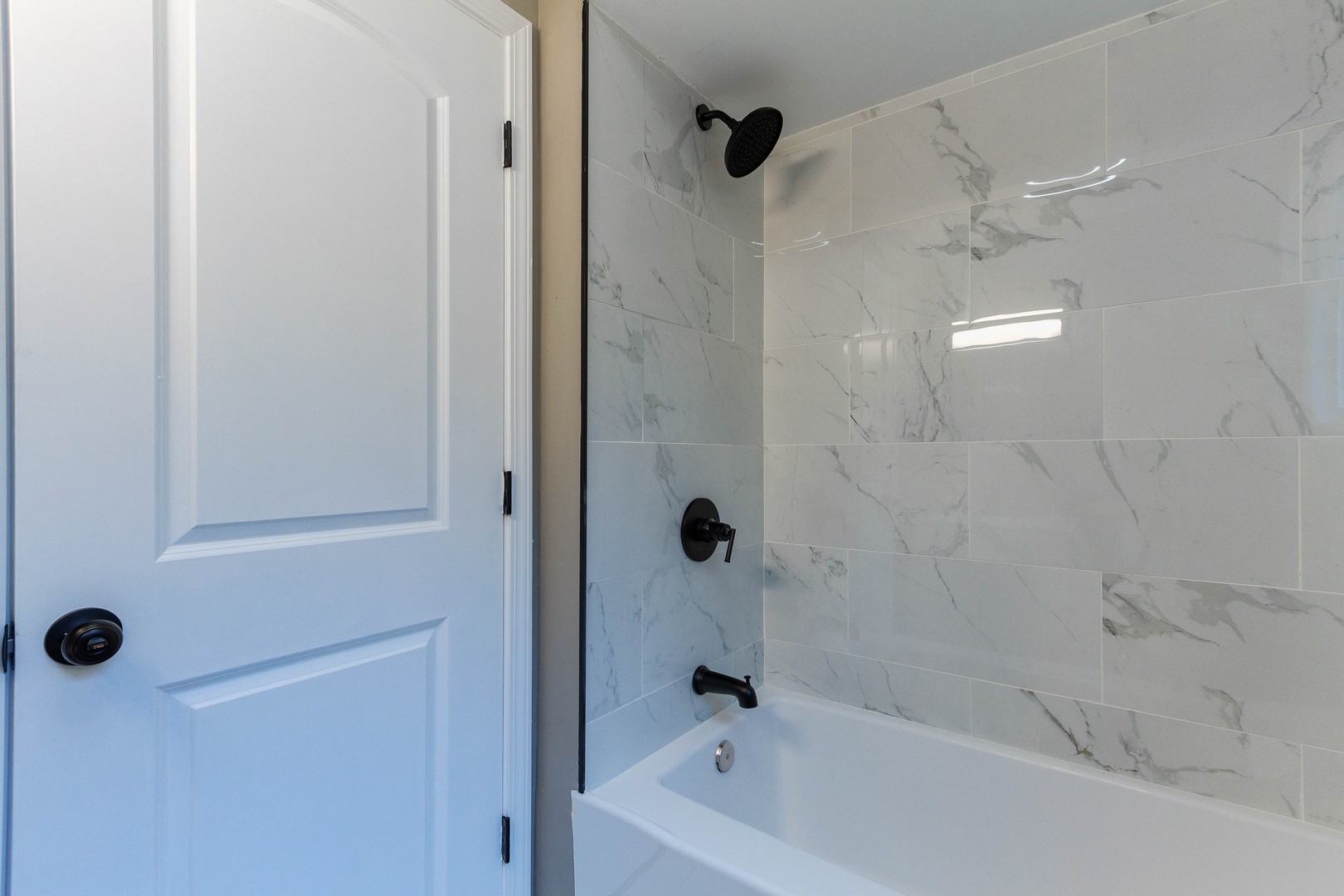 10002 South Normal Avenue Chicago, IL 60628 - Photo 15 of 29 a bathroom with a bathtub