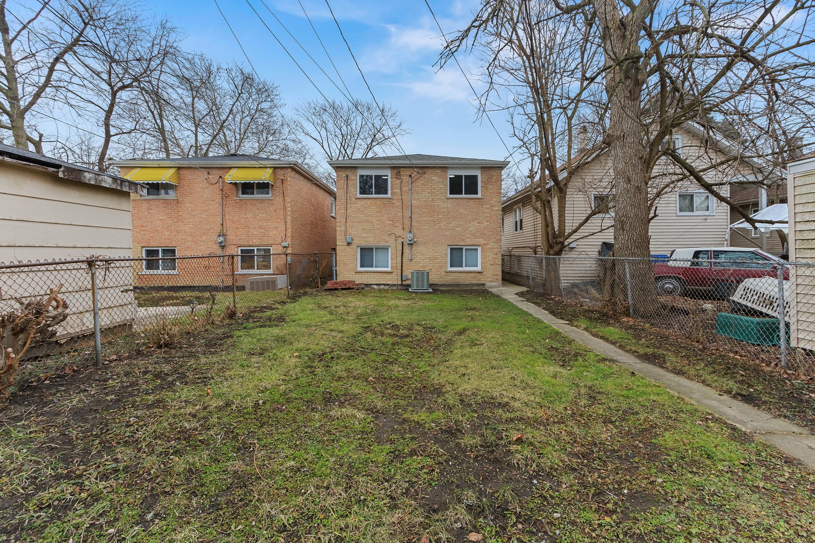 10002 South Normal Avenue Chicago, IL 60628 - Photo 28 of 29 a view of a house with backyard and sitting area