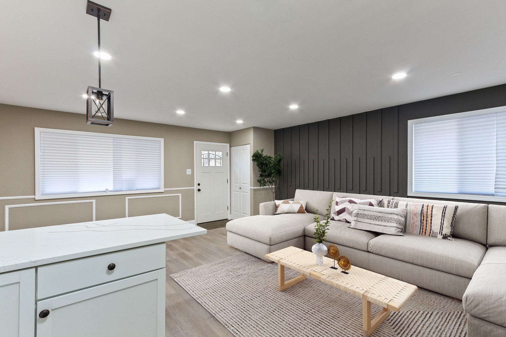 10002 South Normal Avenue Chicago, IL 60628 - Photo 3 of 29 a living room with furniture and a ceiling fan