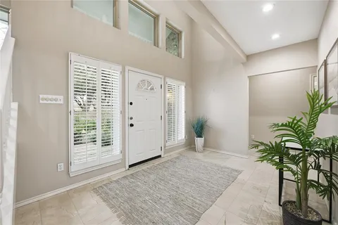a view of a livingroom with a potted plant