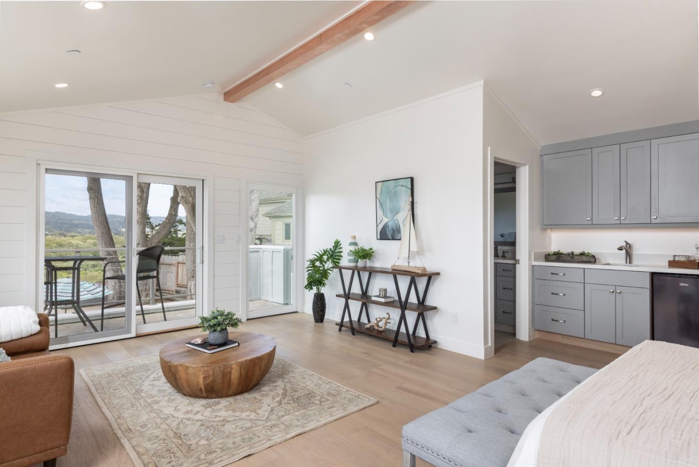2765 Ribera Road Carmel, CA 93923 - Photo 20 of 37 a living room with furniture and a kitchen area