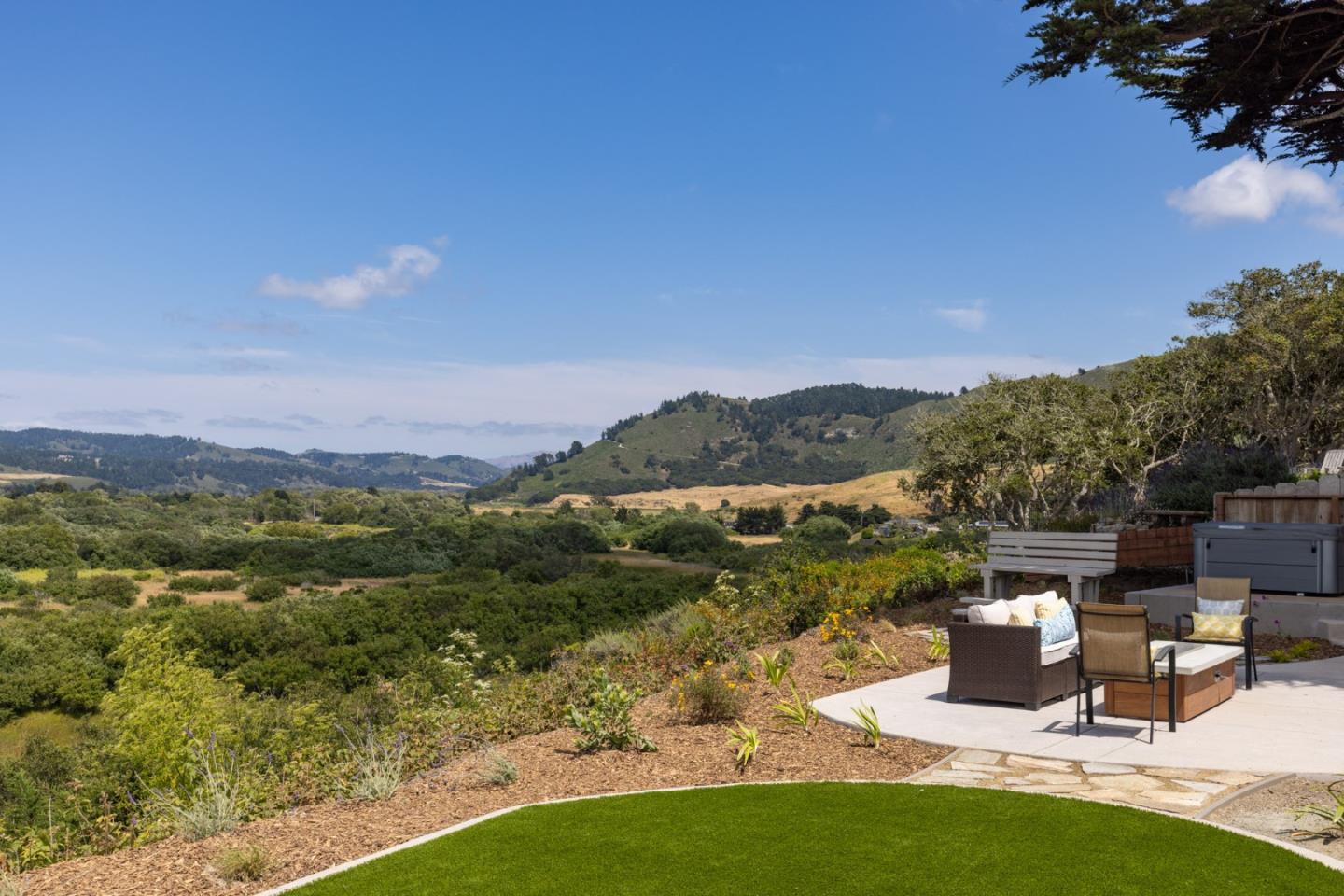 2765 Ribera Road Carmel, CA 93923 - Photo 23 of 37 a view of a lake with a mountain in the background
