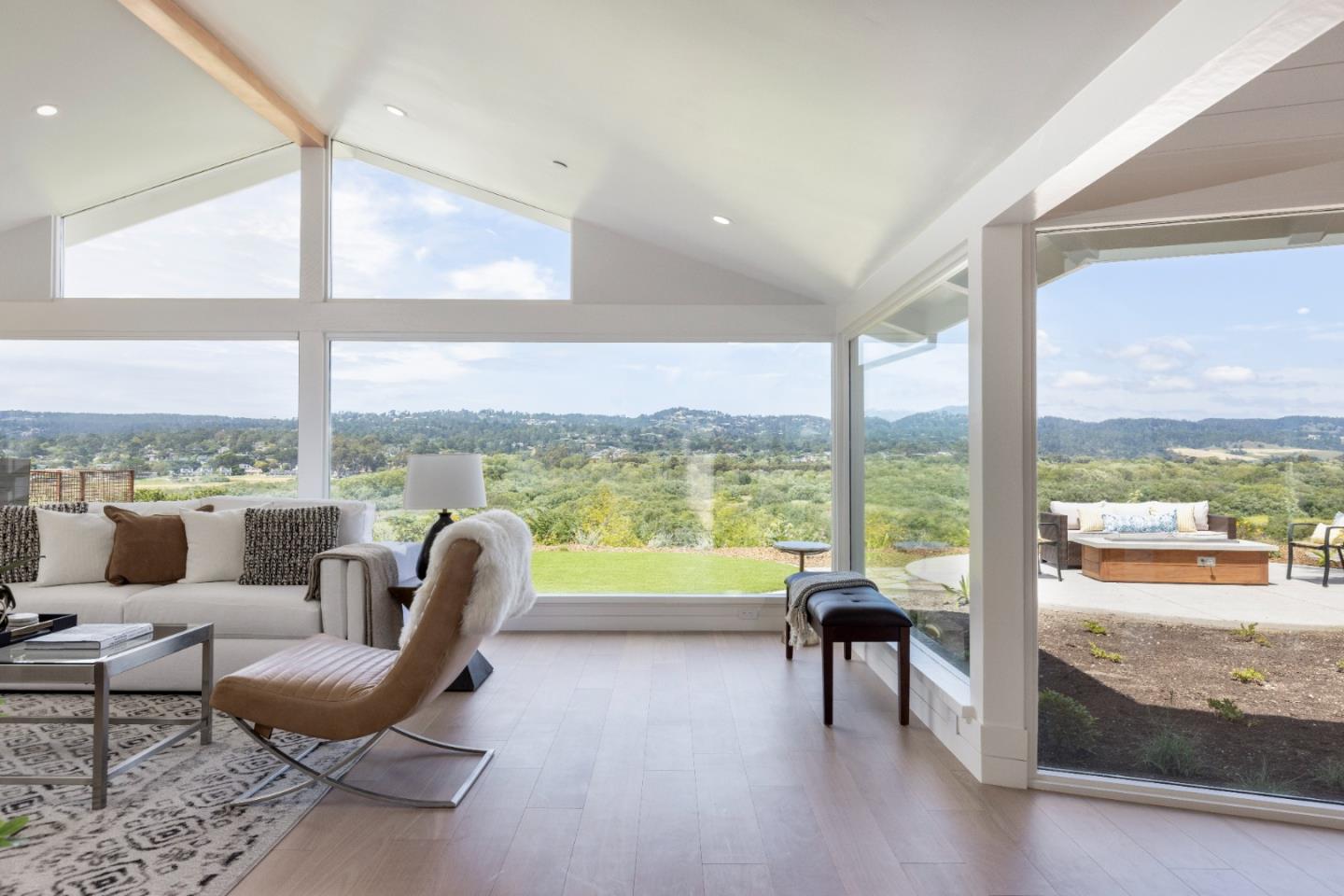 2765 Ribera Road Carmel, CA 93923 - Photo 5 of 37 a living room with furniture and floor to ceiling windows