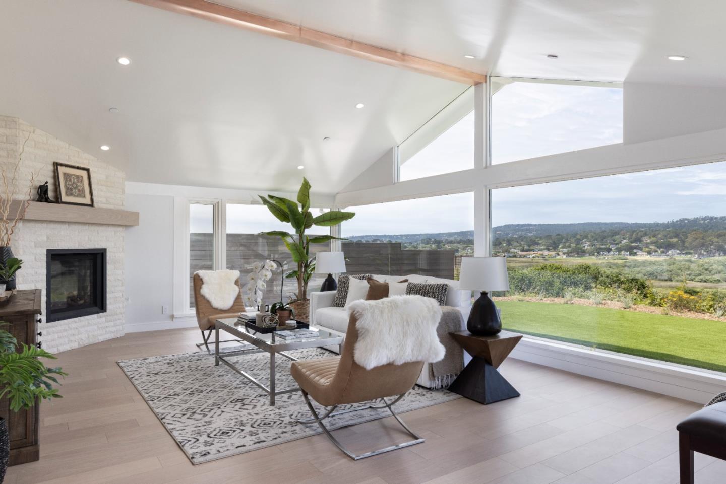 2765 Ribera Road Carmel, CA 93923 - Photo 6 of 37 a living room with furniture and a floor to ceiling window