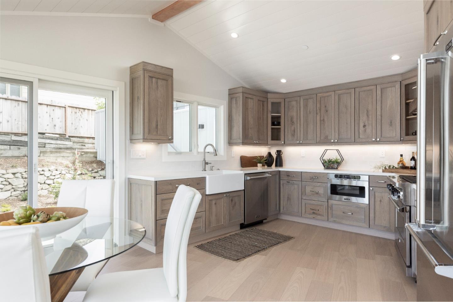 2765 Ribera Road Carmel, CA 93923 - Photo 8 of 37 a kitchen with cabinets and window