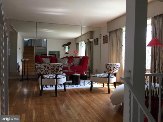 4404 Kinmount Road Lanham, MD 20706 - Photo 3 of 17 a living room with furniture and a wooden floor