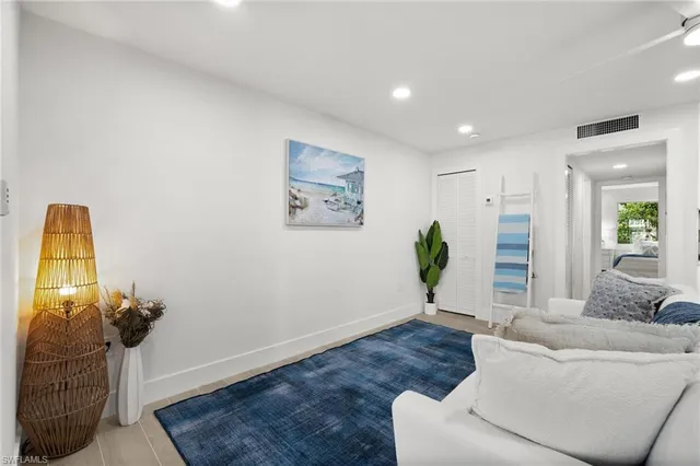 a living room with furniture and a couch