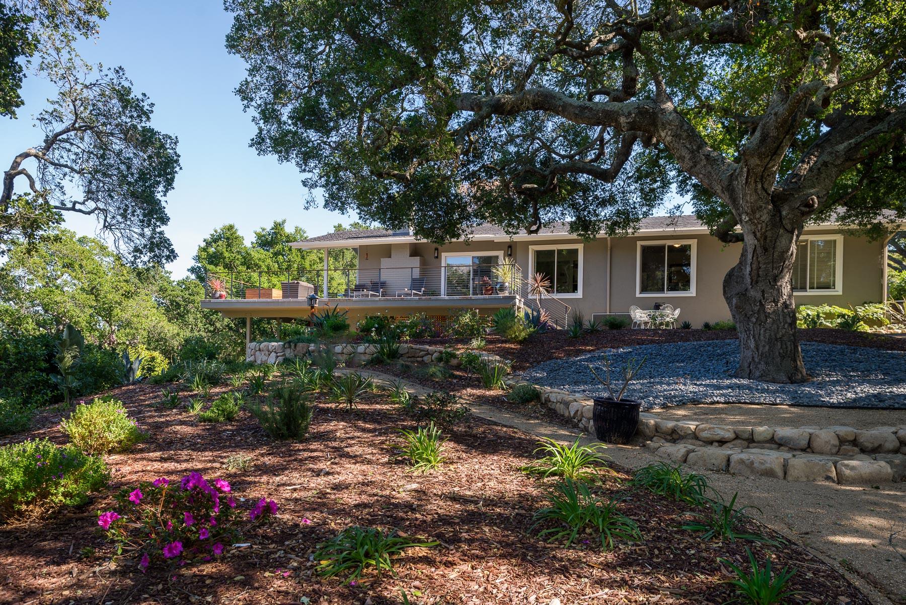 1702 Hillcrest Road Santa Barbara, CA 93103 - Photo 13 of 27 a front view of a house with a yard