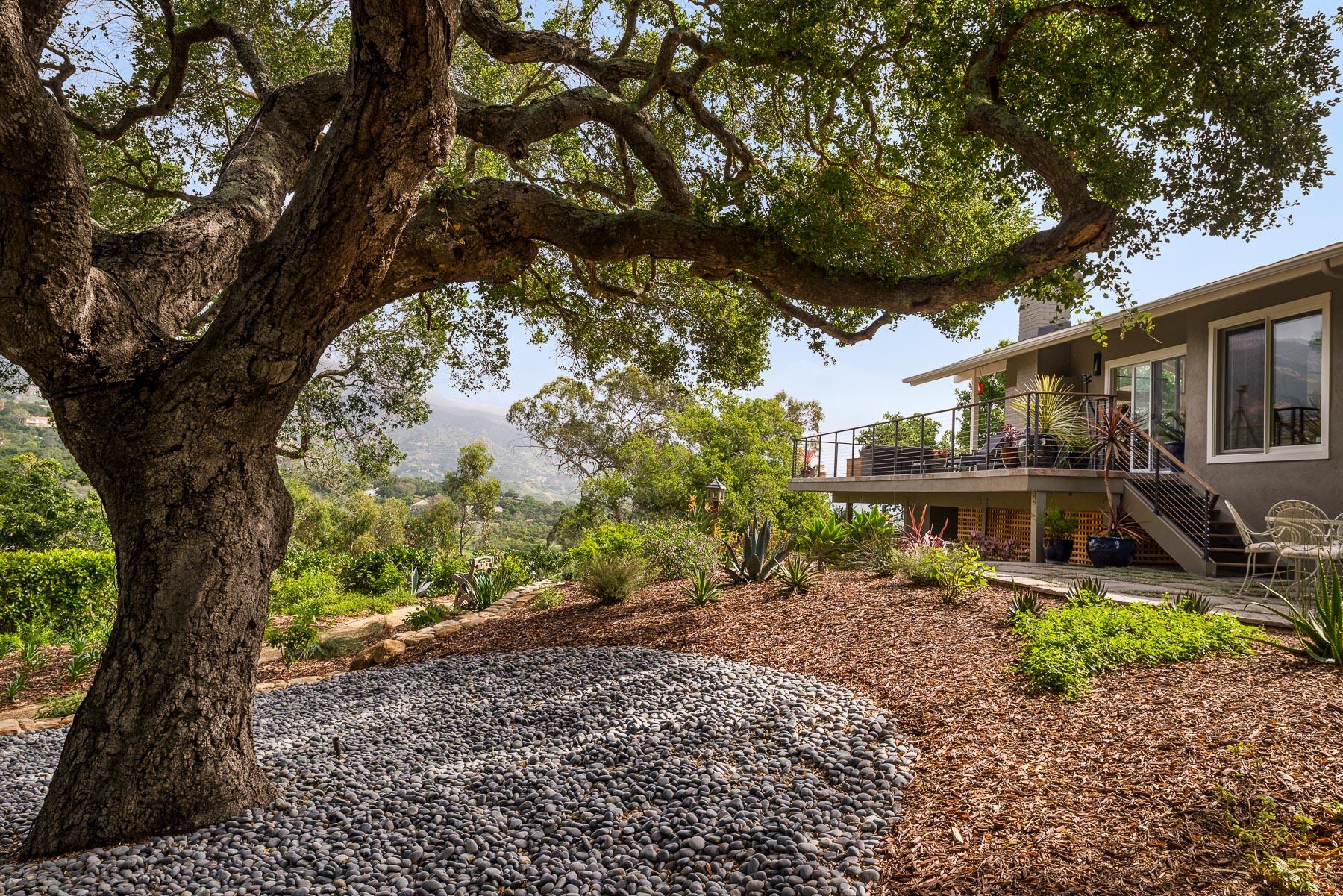 1702 Hillcrest Road Santa Barbara, CA 93103 - Photo 14 of 27 a front view of a house with a yard