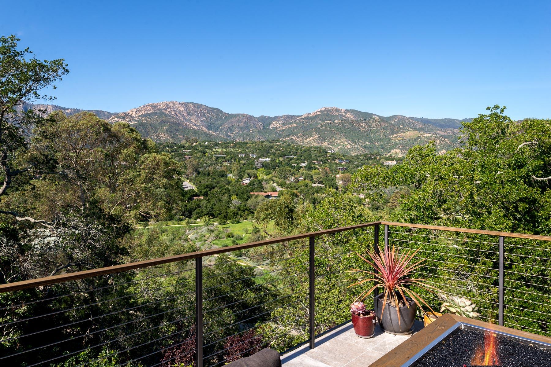 1702 Hillcrest Road Santa Barbara, CA 93103 - Photo 17 of 27 a view of a balcony with a forest