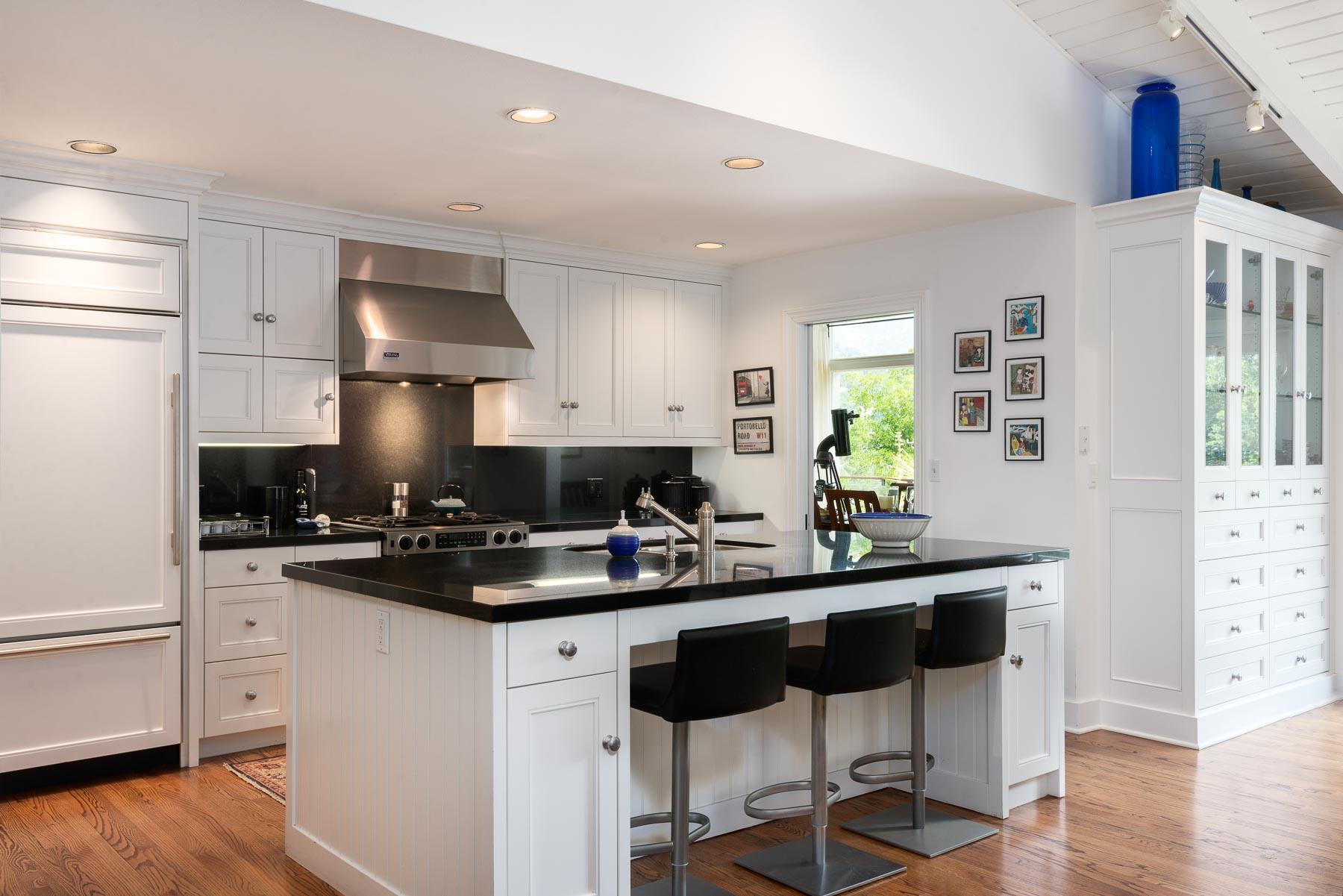 1702 Hillcrest Road Santa Barbara, CA 93103 - Photo 6 of 27 a kitchen with a sink cabinets and wooden floor