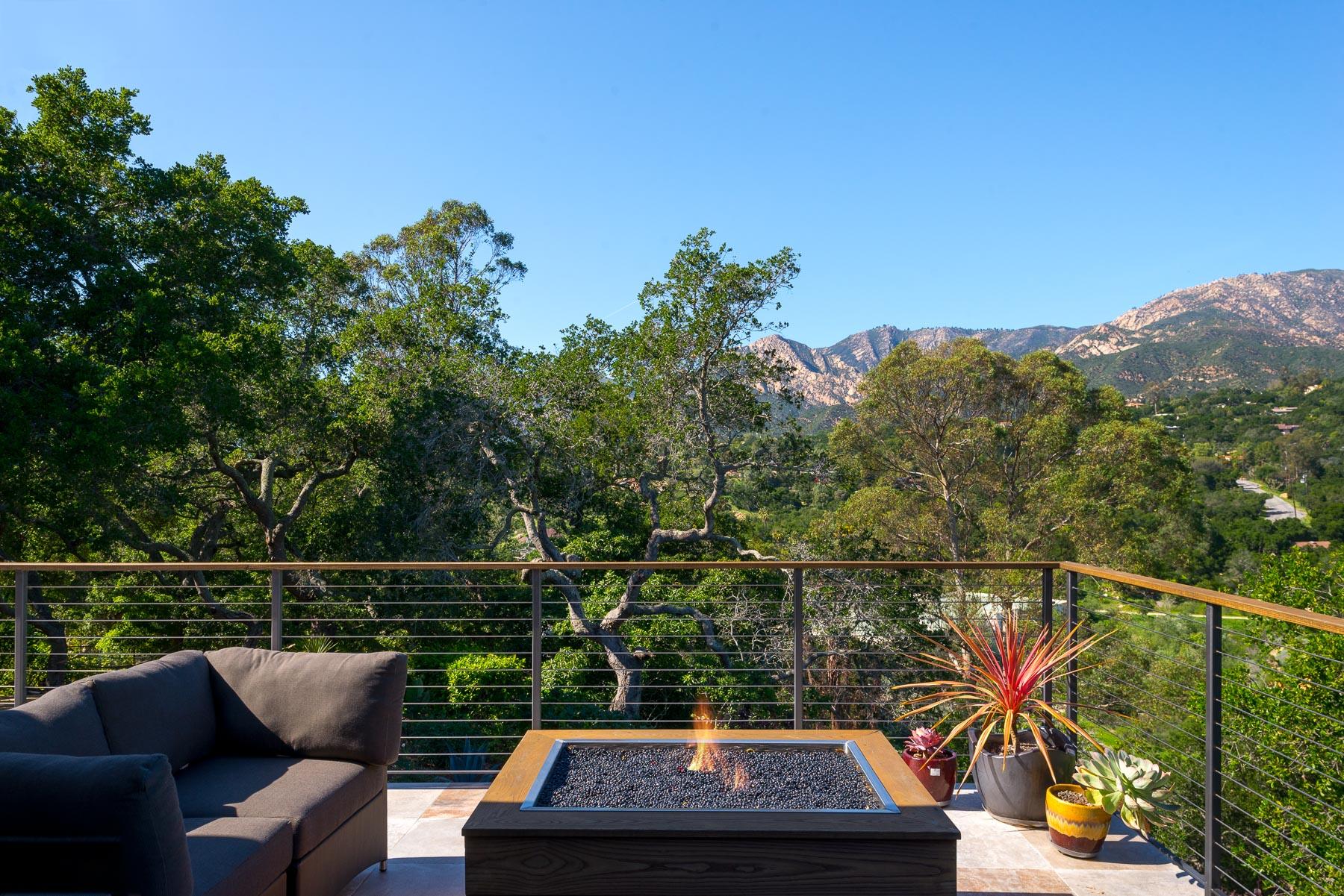 1702 Hillcrest Road Santa Barbara, CA 93103 - Photo 9 of 27 a view of a chair and table on the balcony