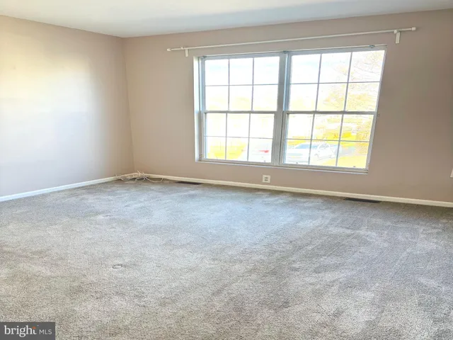 a bathroom with a toilet a sink and bathtub