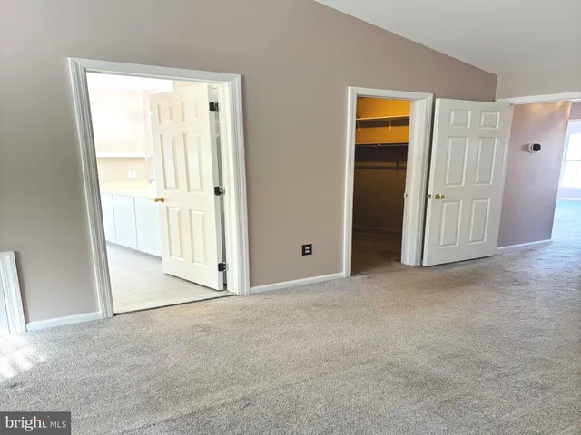 a view of a room with an empty space