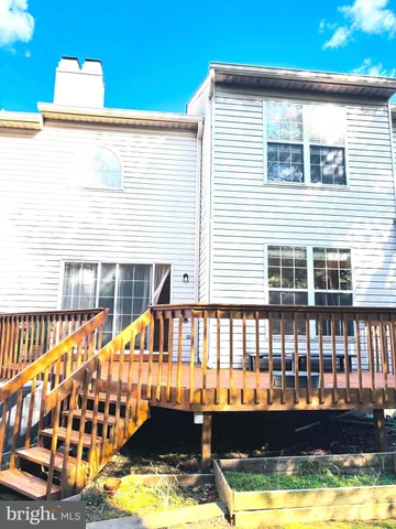 a view of a balcony with a small white roof