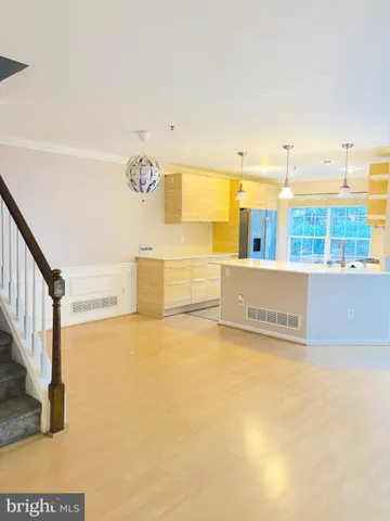 a view of a kitchen with a sink