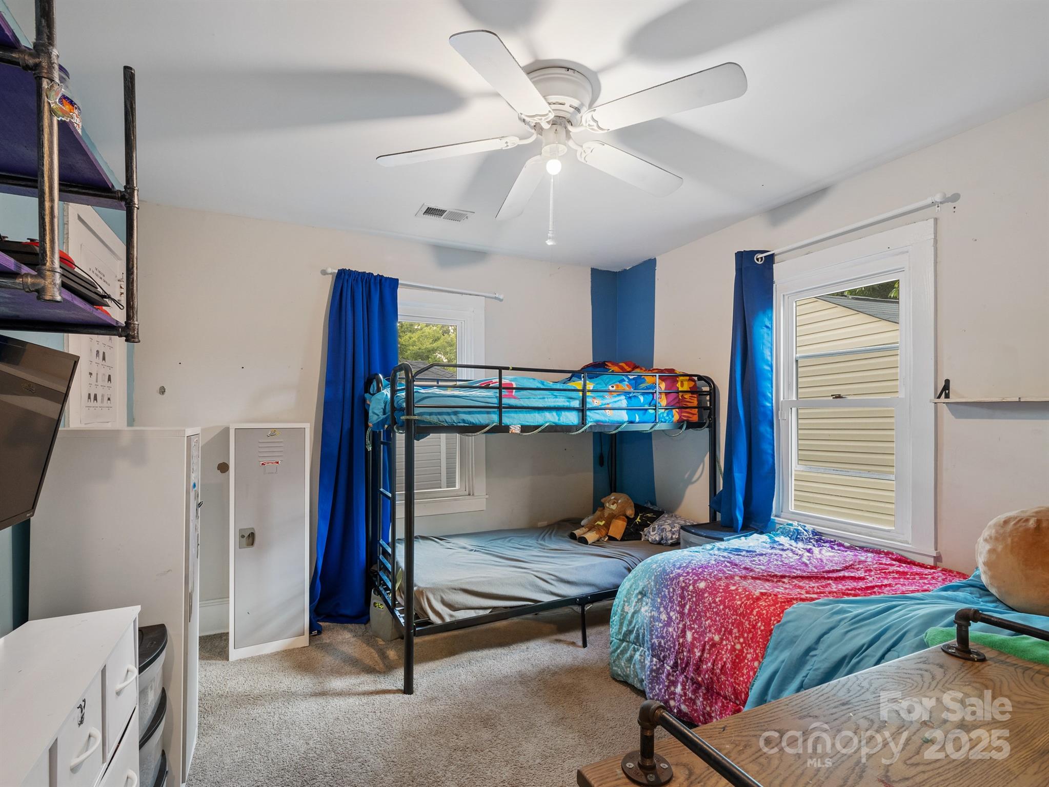 206 Friedheim Road Rock Hill, SC 29730 - Photo 14 of 25 a bedroom with a bed and a chandelier