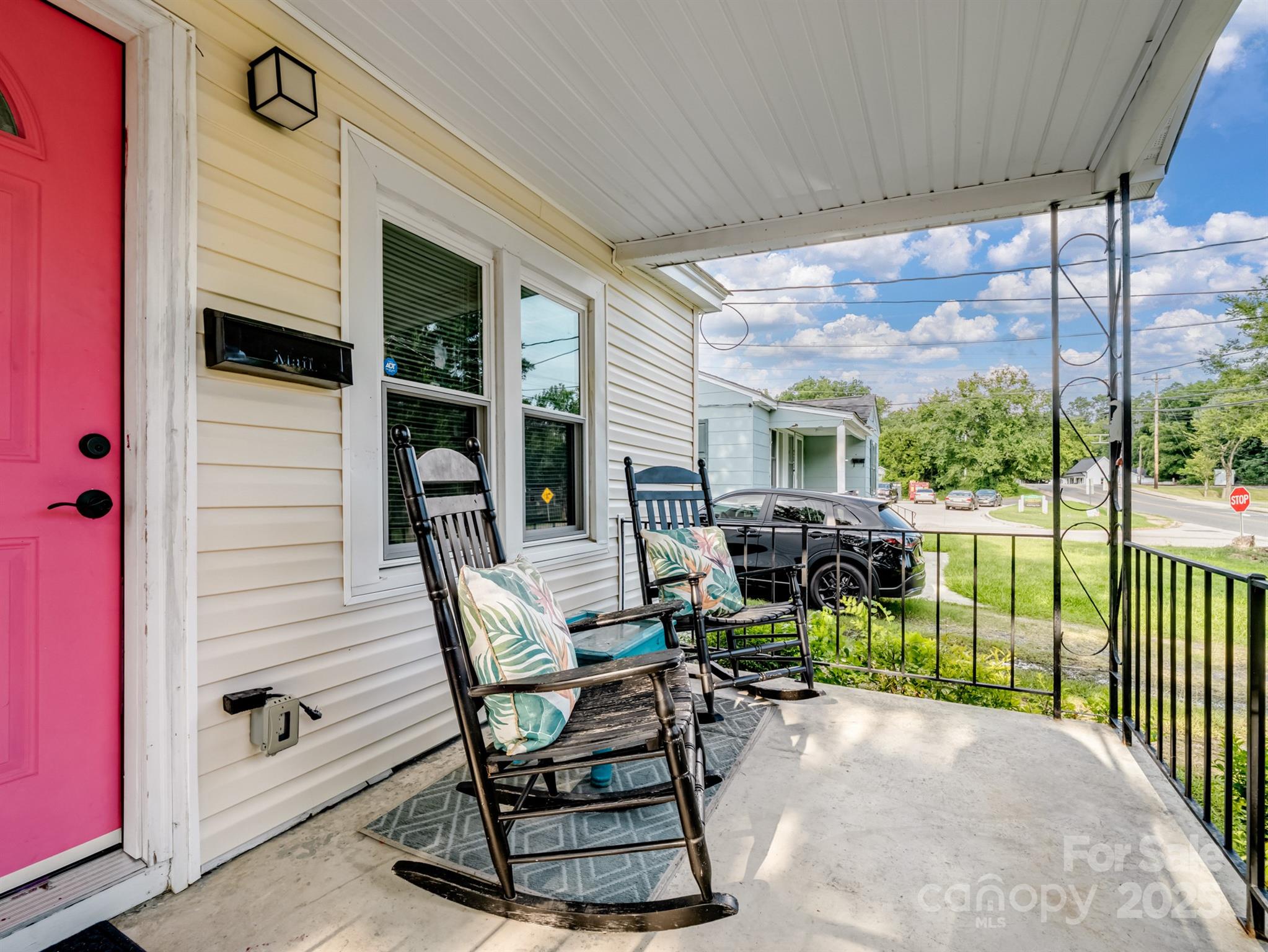 206 Friedheim Road Rock Hill, SC 29730 - Photo 2 of 25 a view of a patio with a table and chairs and a floor to ceiling window