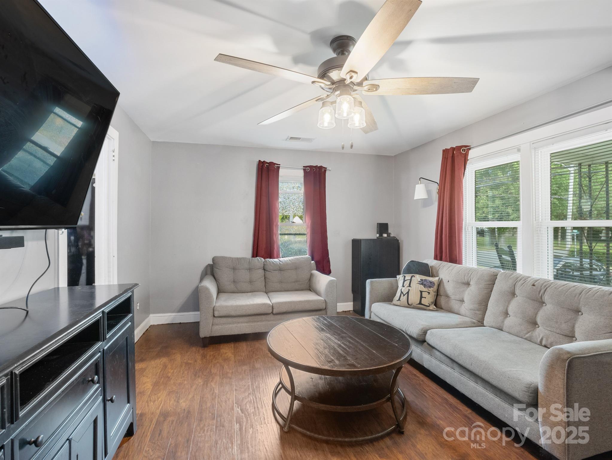 206 Friedheim Road Rock Hill, SC 29730 - Photo 5 of 25 a living room with furniture and a flat screen tv